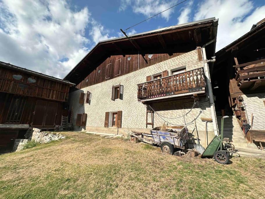 Mountain House With Two Barns And A Garden *